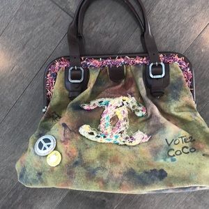 Chanel on the pavement bowling bag